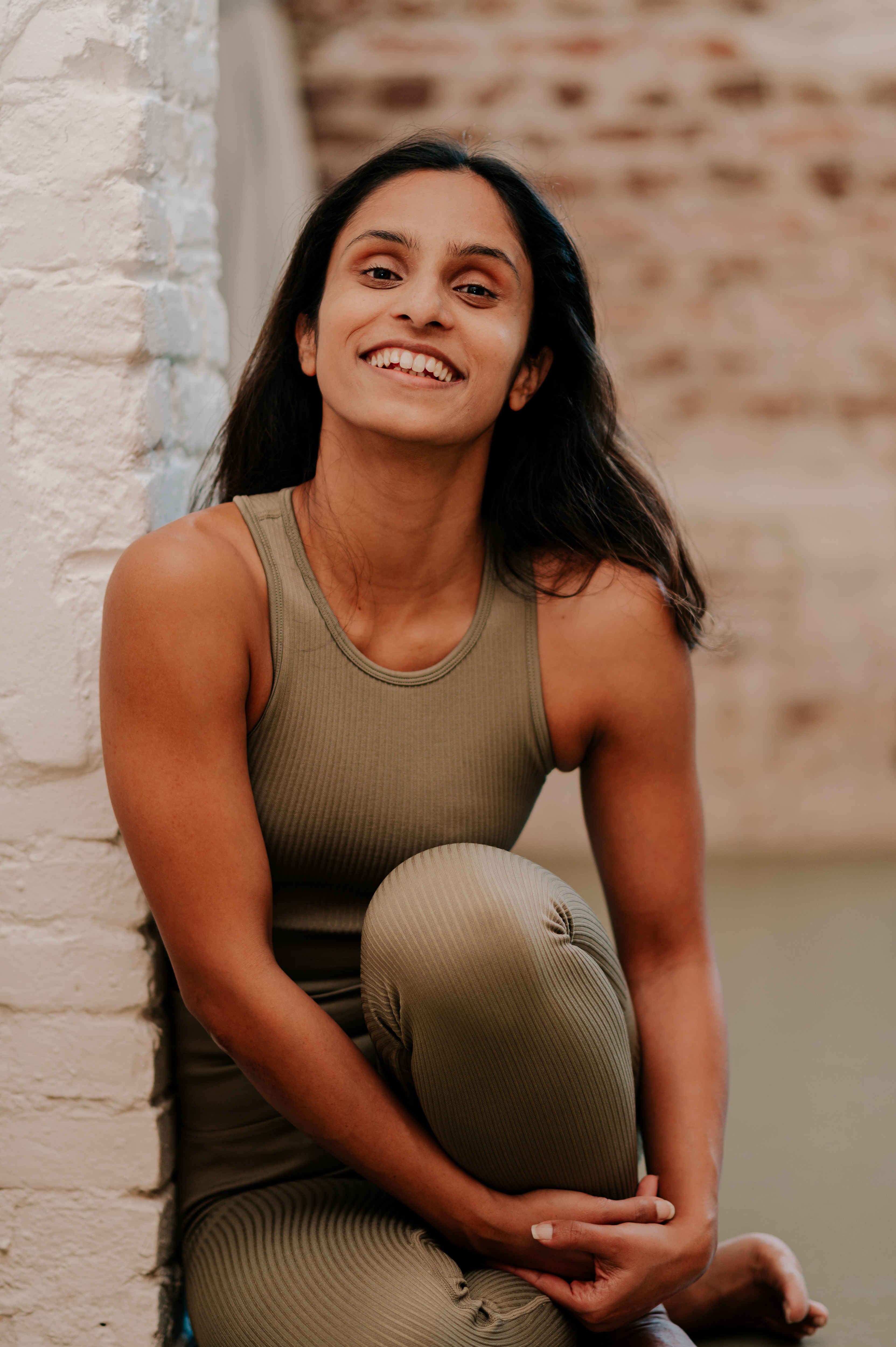 Tanu, founder of Wo-Health, smiling warmly - a mother who understands the journey